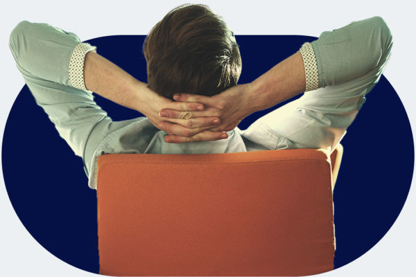 business owner relaxing in office chair